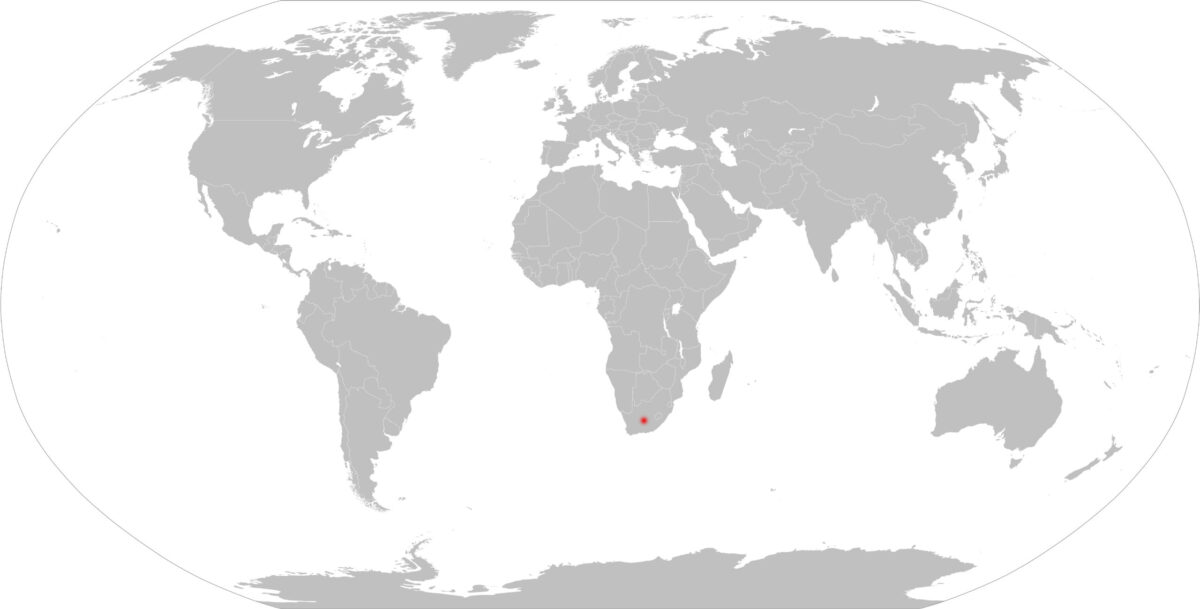 Slepá mapa světa s vyznačenou zemí červeně